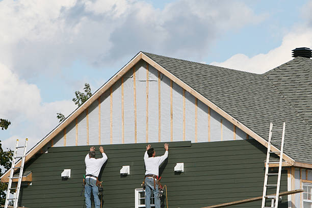 Professional Siding Installation technician working in Fulton, IL